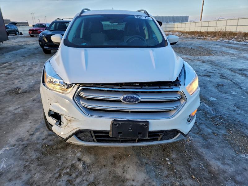 Photo 5 from auction – 2018 FORD ESCAPE SE with VIN 1FMCU9GD8JUB28703