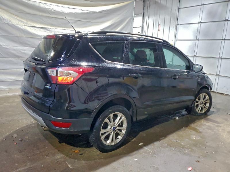 Photo 3 from auction – 2017 FORD ESCAPE SE with VIN 1FMCU9GD6HUE50685