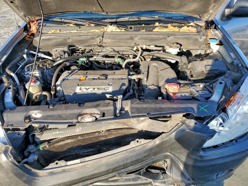 Photo 12 from auction – 2006 HONDA CR-V LX with VIN JHLRD68566C009407