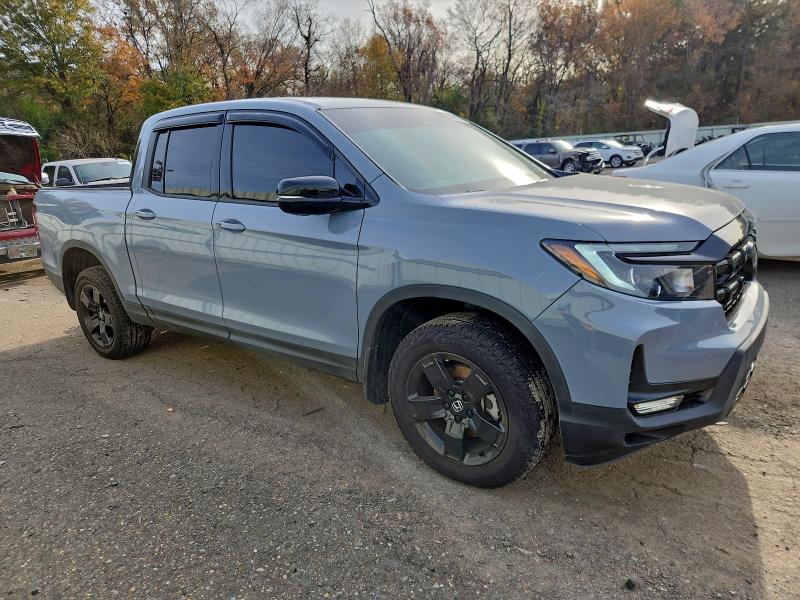 Photo 4 from auction – 2024 HONDA RIDGELINE with VIN 5FPYK3F85RB018480