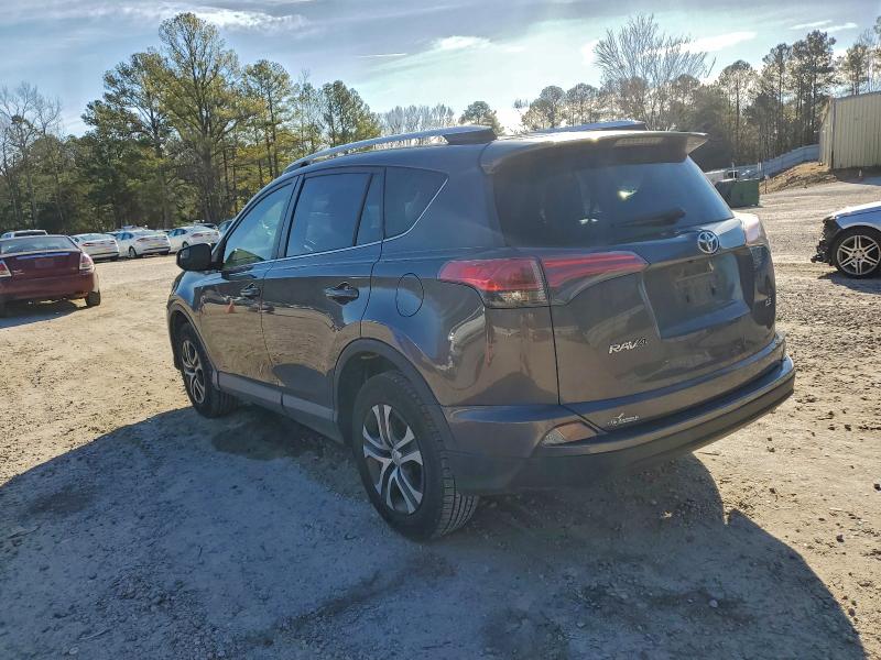 Photo 2 from auction – 2016 TOYOTA RAV4 with VIN JTMZFREVXGJ063531