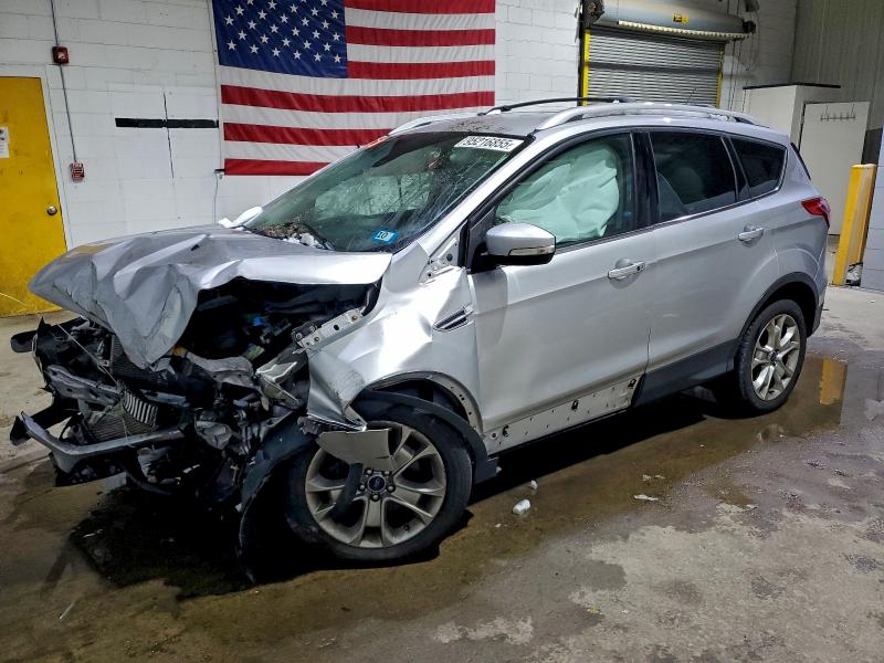 FORD ESCAPE TIT 2016 with VIN 1FMCU9J98GUB64243 - Photo from auction