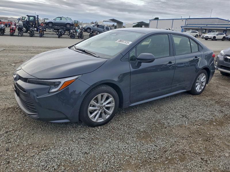 TOYOTA COROLLA LE 2025 with VIN JTDBCMFE2S3090232 - Photo from auction