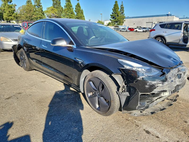 Photo 4 from auction – 2018 TESLA MODEL 3 with VIN 5YJ3E1EA1JF172997