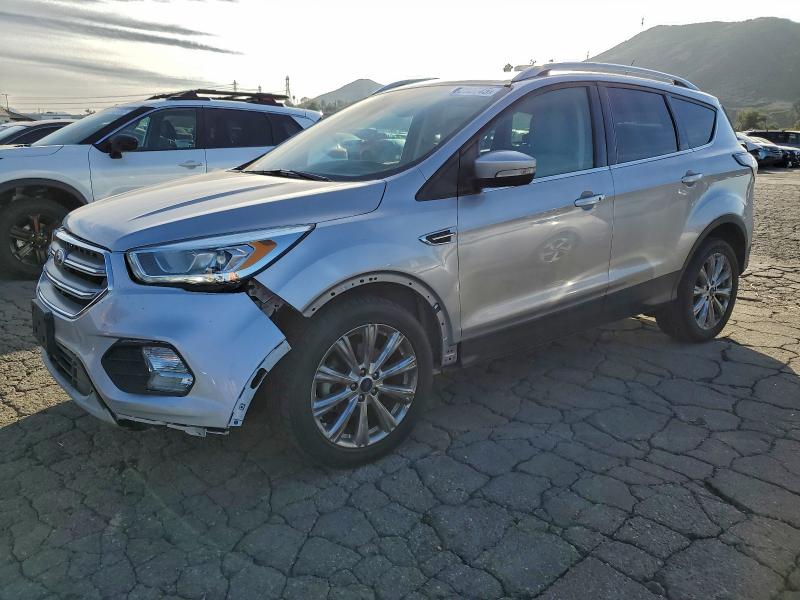 FORD ESCAPE TIT 2017 with VIN 1FMCU0JD0HUA32580 - Photo from auction