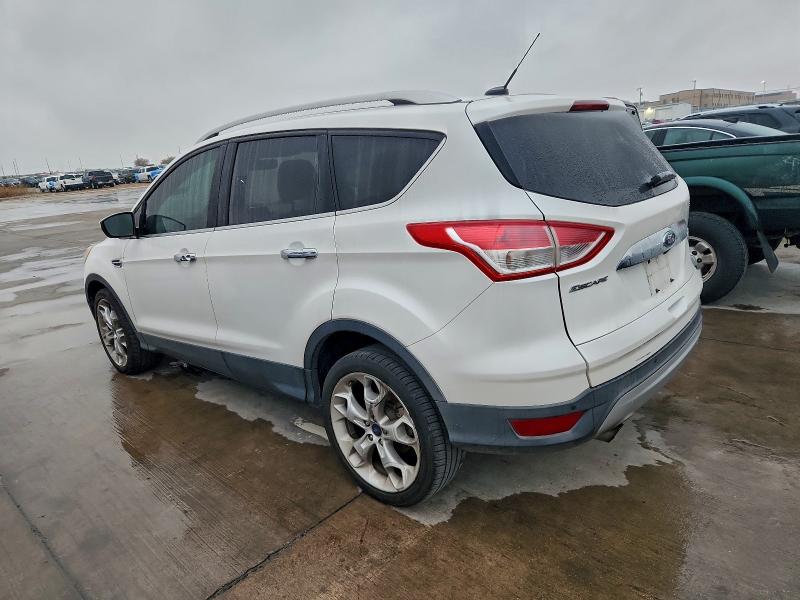 Photo 2 from auction – 2016 FORD ESCAPE TIT with VIN 1FMCU0J90GUA11951