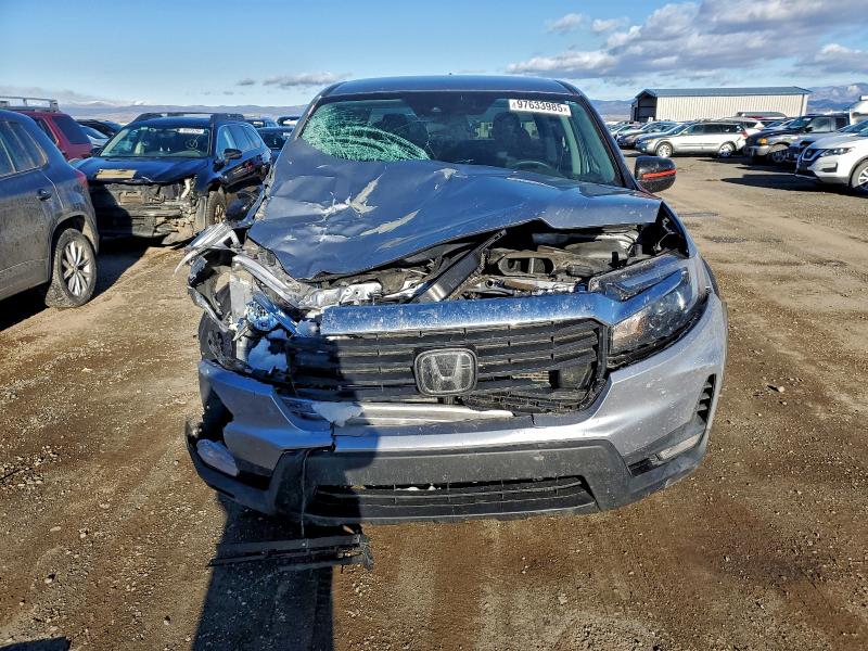 Photo 5 from auction – 2021 HONDA RIDGELINE with VIN 5FPYK3F14MB009989