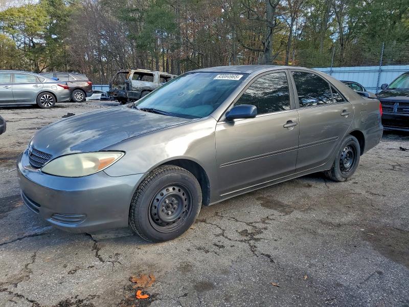 TOYOTA CAMRY LE 2004 with VIN JTDBE32K240257872 - Photo from auction