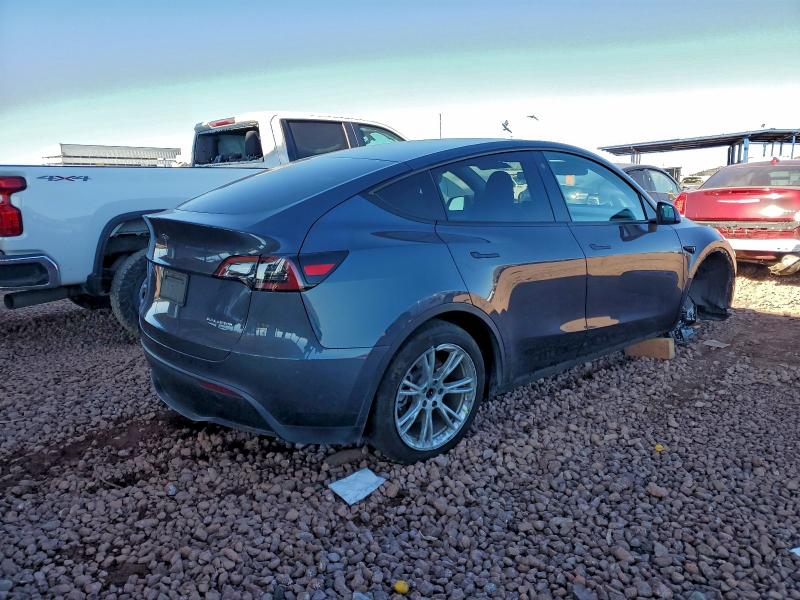 Photo 3 from auction – 2023 TESLA MODEL Y with VIN 7SAYGDEE6PF618576