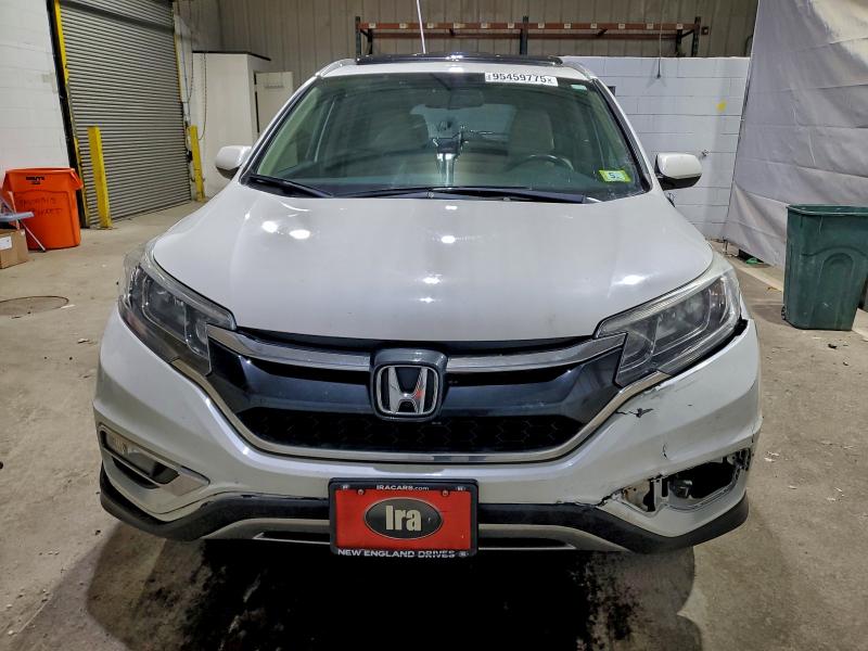 Photo 5 from auction – 2016 HONDA CR-V EXL with VIN 5J6RM3H70GL003708