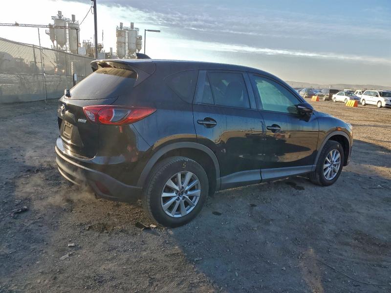 Photo 3 from auction – 2015 MAZDA CX-5 SPORT with VIN JM3KE2BE8F0490900