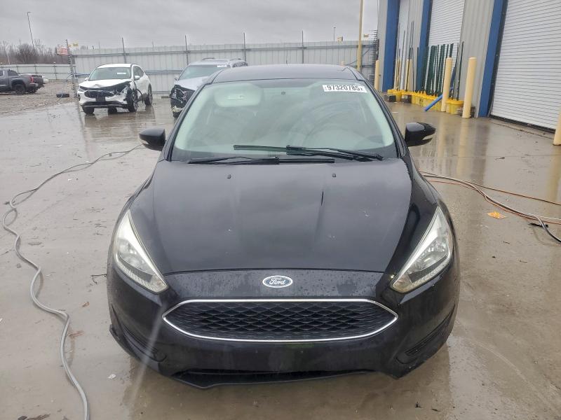 Photo 5 from auction – 2015 FORD FOCUS SE with VIN 1FADP3F22FL298250