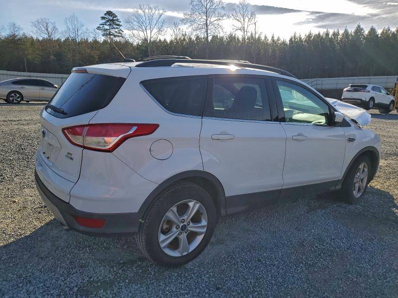 Photo 3 from auction – 2015 FORD ESCAPE SE with VIN 1FMCU9GX0FUC28540