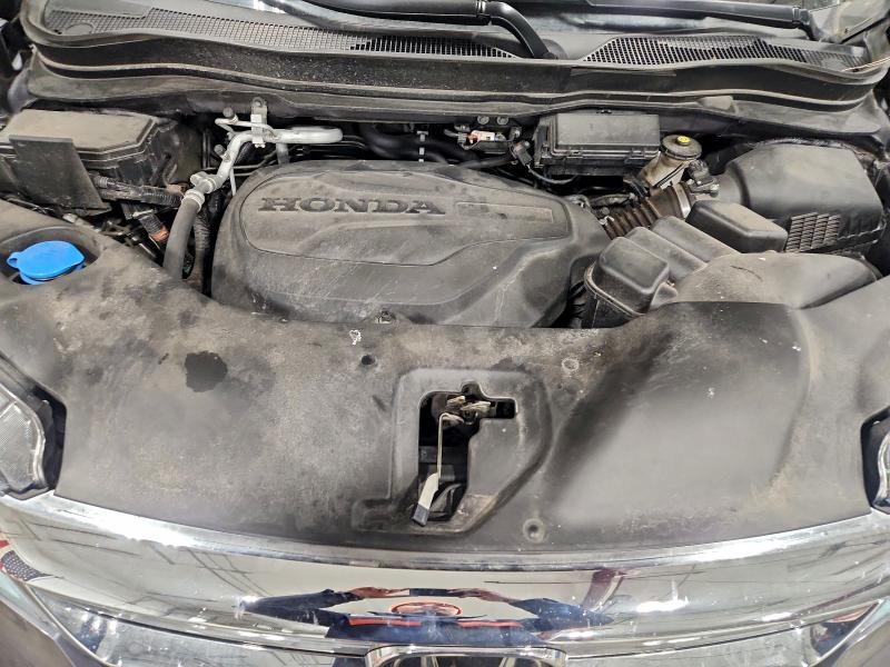 Photo 12 from auction – 2021 HONDA PILOT ELIT with VIN 5FNYF6H05MB075731