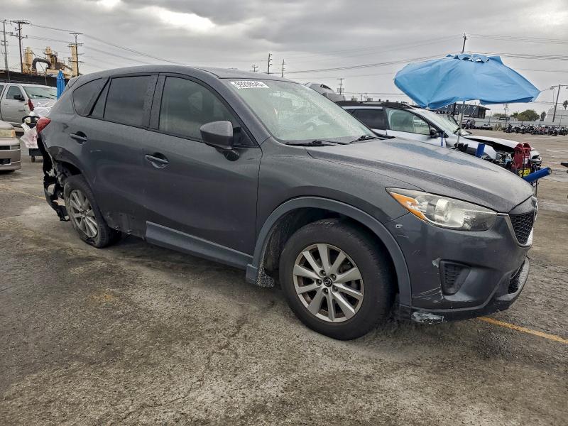 Photo 4 from auction – 2015 MAZDA CX-5 SPORT with VIN JM3KE2BEXF0462175