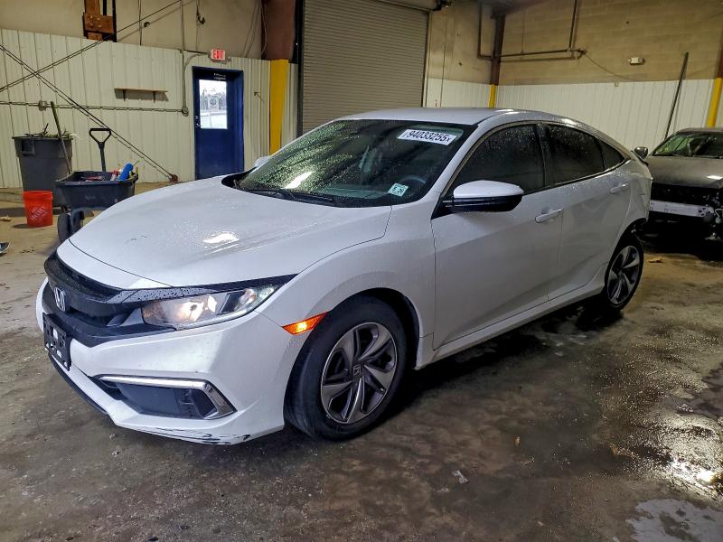 HONDA CIVIC LX 2021 with VIN 19XFC2F65ME200362 - Photo from auction