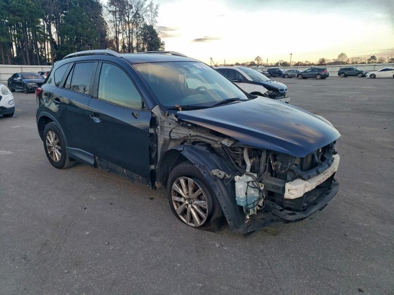 Photo 4 from auction – 2013 MAZDA CX-5 TOURI with VIN JM3KE2CE0D0156047