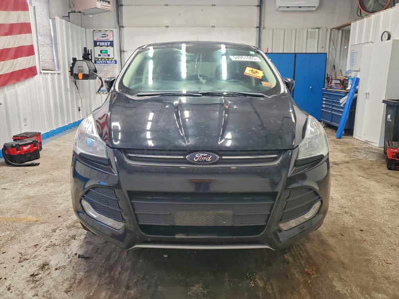 Photo 5 from auction – 2016 FORD ESCAPE with VIN 1FMCU9GX5GUB64447