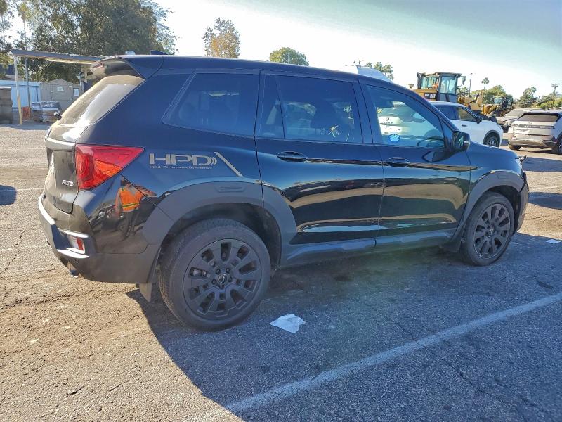 Photo 3 from auction – 2023 HONDA PASSPORT with VIN 5FNYF8H54PB030484