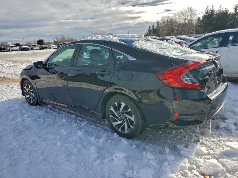 Photo 2 from auction – 2018 HONDA CIVIC LX with VIN 2HGFC2F60JH021101