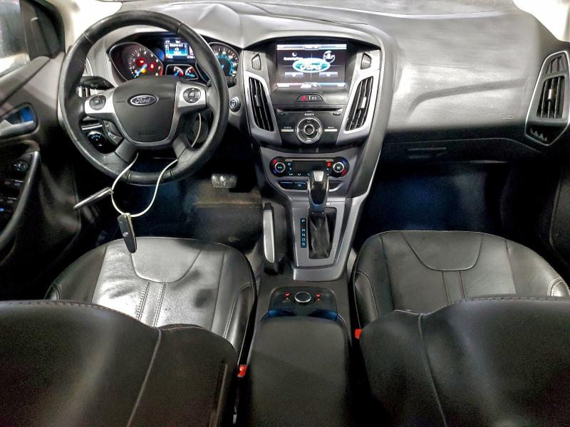 Photo 8 from auction – 2014 FORD FOCUS TITA with VIN 1FADP3N21EL166516