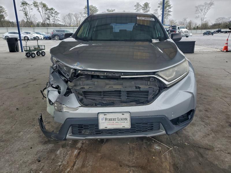 Photo 5 from auction – 2017 HONDA CR-V LX with VIN 7FARW5H31HE014203
