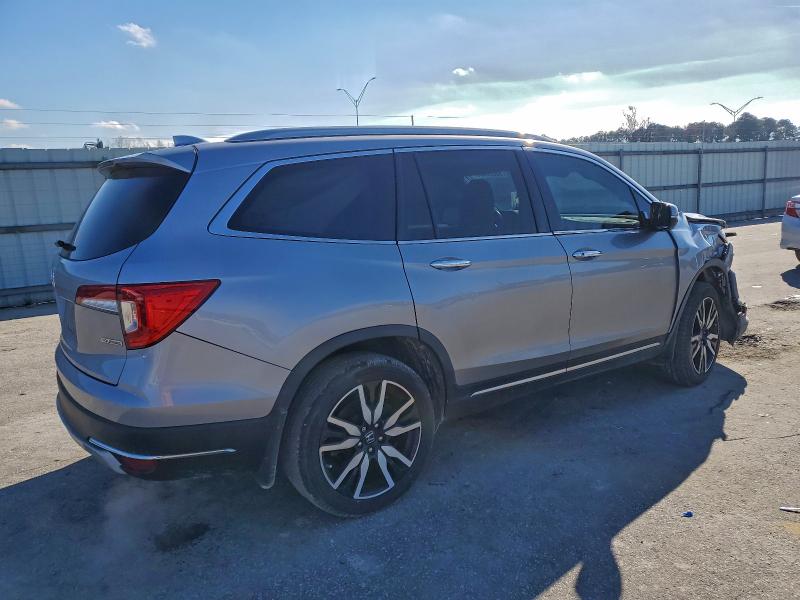 Photo 3 from auction – 2021 HONDA PILOT TOUR with VIN 5FNYF5H95MB009513