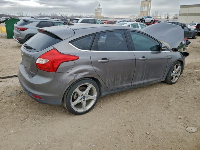 Photo 3 from auction – 2014 FORD FOCUS TITA with VIN 1FADP3N23EL408092