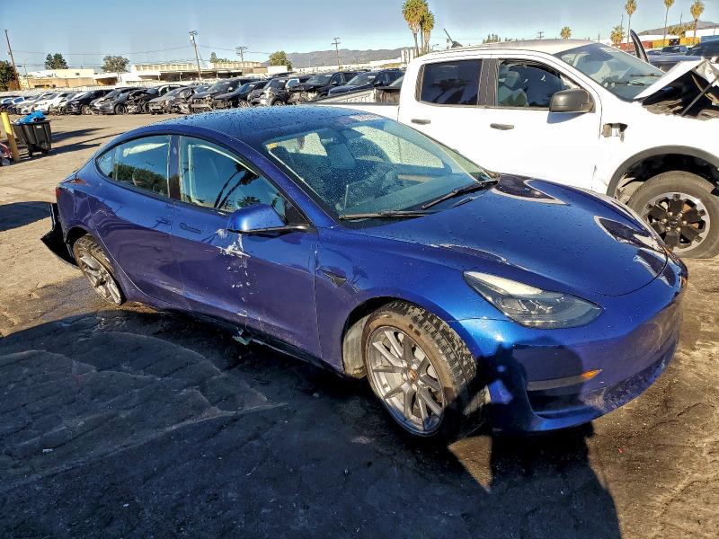 Photo 4 from auction – 2023 TESLA MODEL 3 with VIN 5YJ3E1EA3PF449030