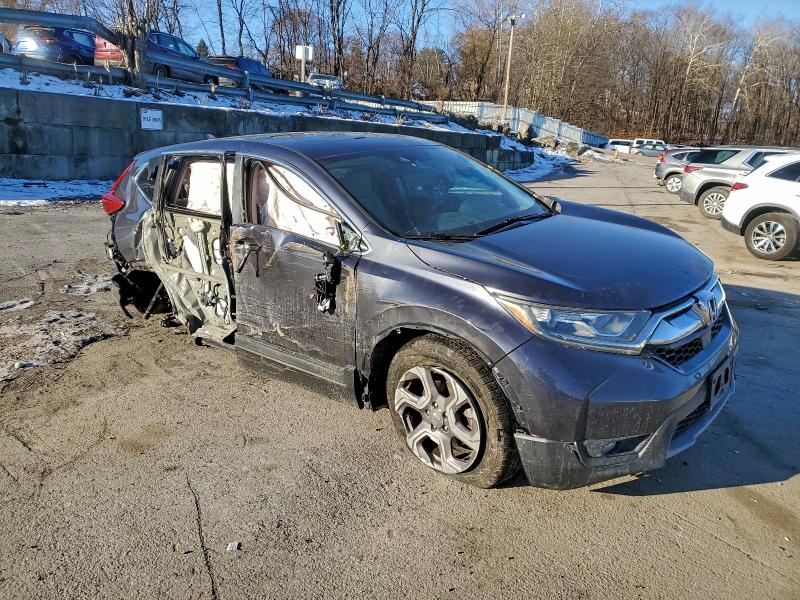 Photo 4 from auction – 2018 HONDA CR-V EX with VIN 7FARW2H58JE077000