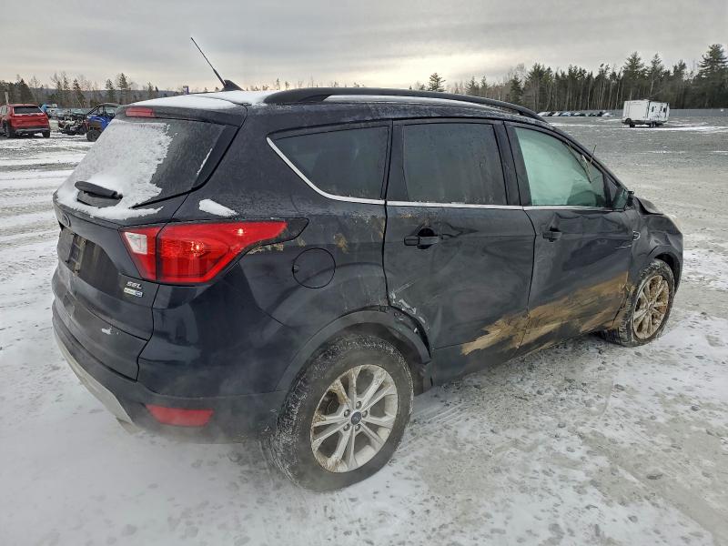 Photo 3 from auction – 2019 FORD ESCAPE SEL with VIN 1FMCU9HD1KUB71540