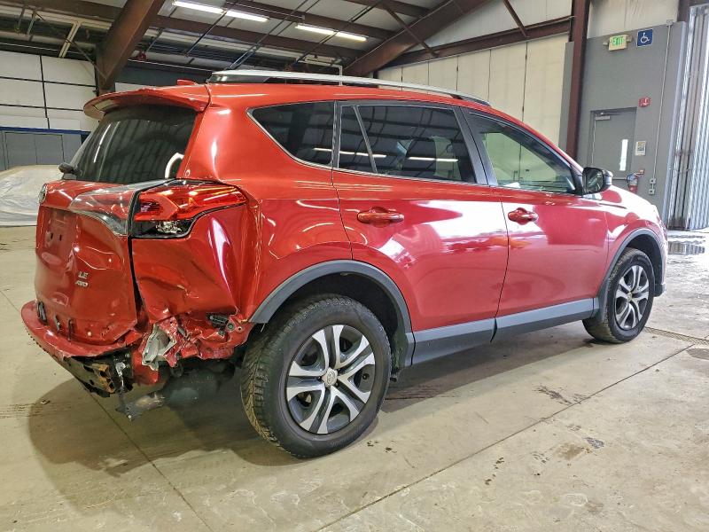 Photo 3 from auction – 2017 TOYOTA RAV4 LE with VIN JTMBFREV7HJ126250