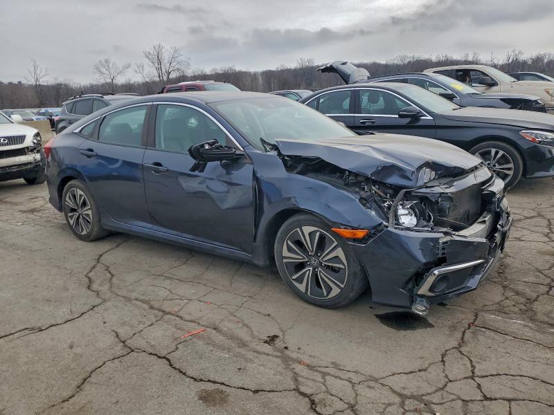 Photo 4 from auction – 2019 HONDA CIVIC EX with VIN 2HGFC1F36KH651965