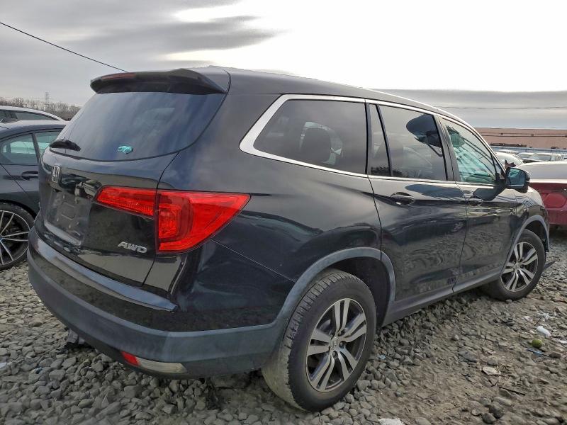 Photo 3 from auction – 2016 HONDA PILOT EXL with VIN 5FNYF6H58GB054937