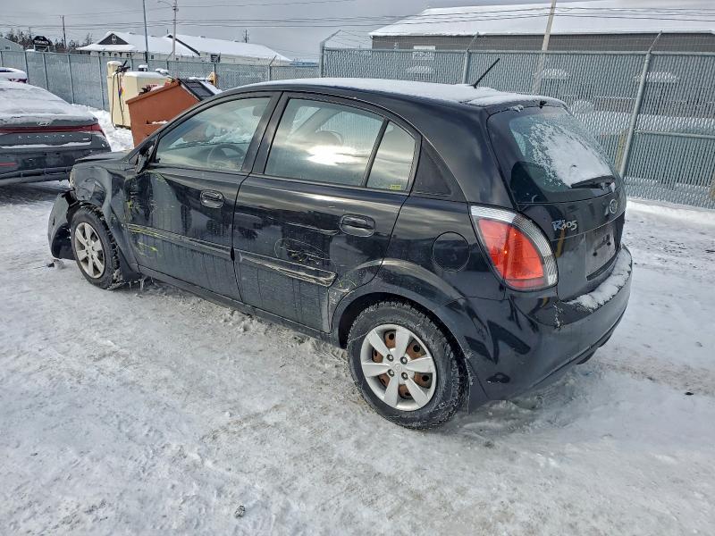 Photo 2 from auction – 2011 KIA RIO BASE with VIN KNADH5B35B6838598