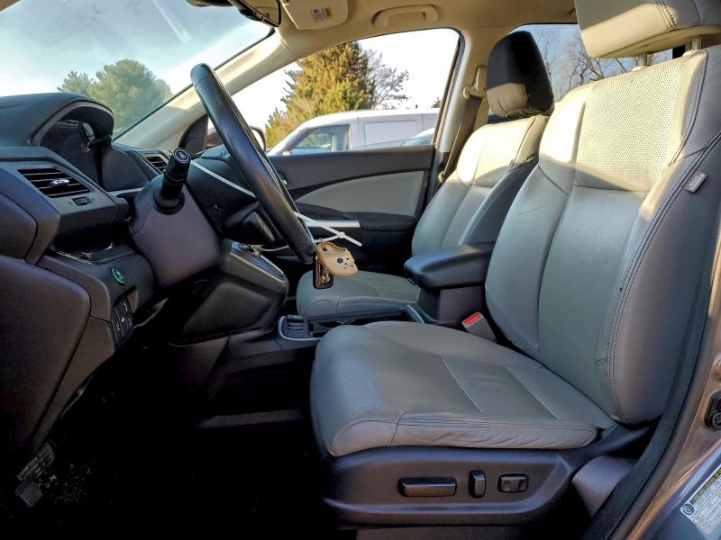 Photo 7 from auction – 2016 HONDA CRV with VIN 5J6RM4H98GL079863