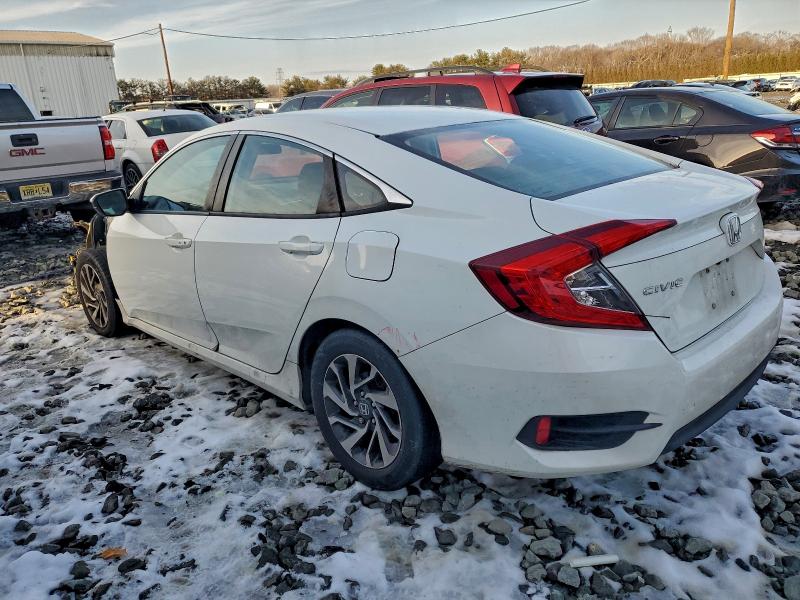 Photo 2 from auction – 2016 HONDA CIVIC EX with VIN 2HGFC2F71GH532933