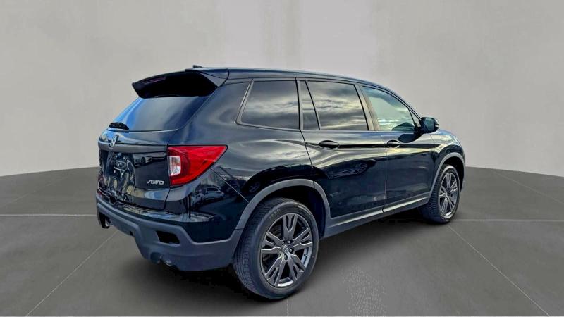 Photo 4 from auction – 2021 HONDA PASSPORT E with VIN 5FNYF8H52MB024288