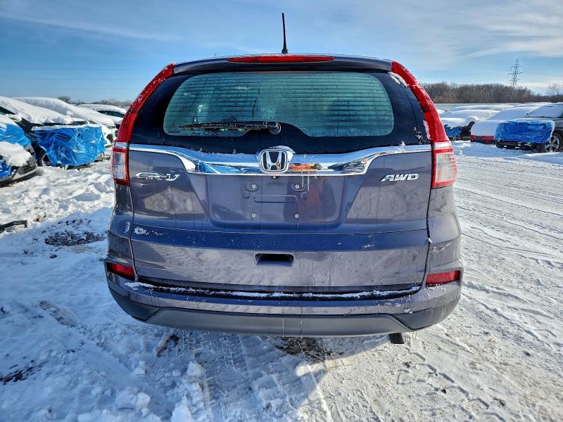 Photo 6 from auction – 2015 HONDA CR-V LX with VIN 5J6RM4H31FL034452