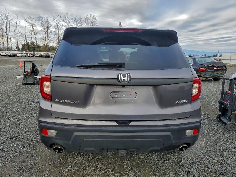 Photo 6 from auction – 2021 HONDA PASSPORT E with VIN 5FNYF8H51MB032480