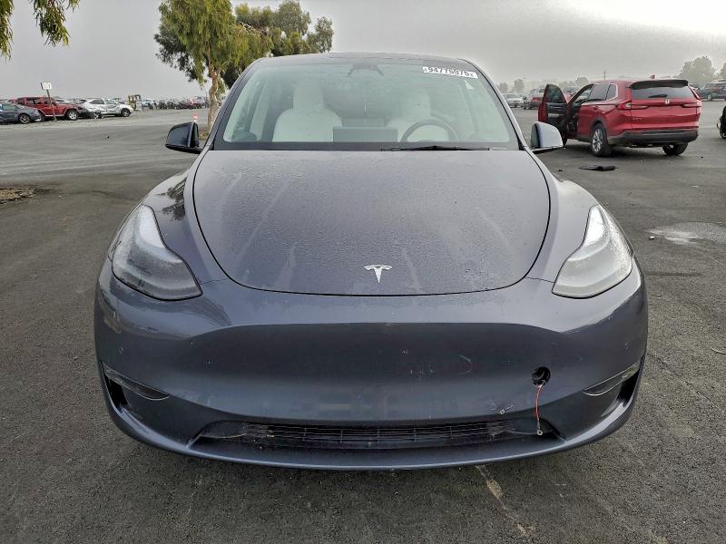 Photo 5 from auction – 2022 TESLA MODEL Y with VIN 7SAYGDEF6NF558062