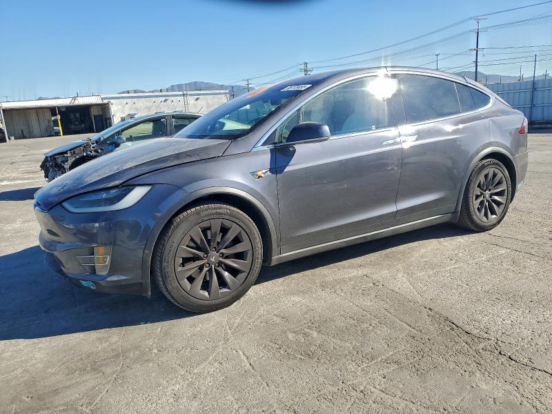 TESLA MODEL X 2018 with VIN 5YJXCDE27JF138001 - Photo from auction