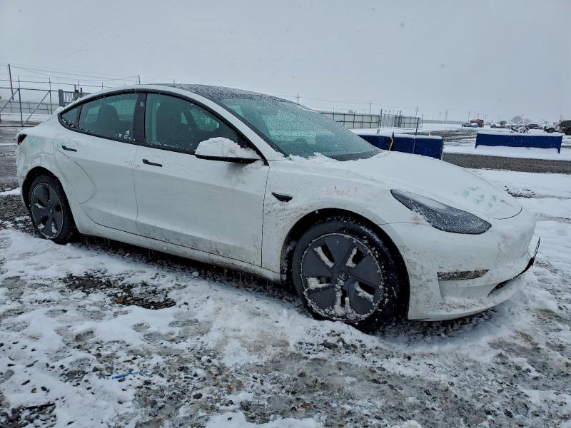 Photo 4 from auction – 2022 TESLA MODEL 3 with VIN 5YJ3E1EA1NF115222