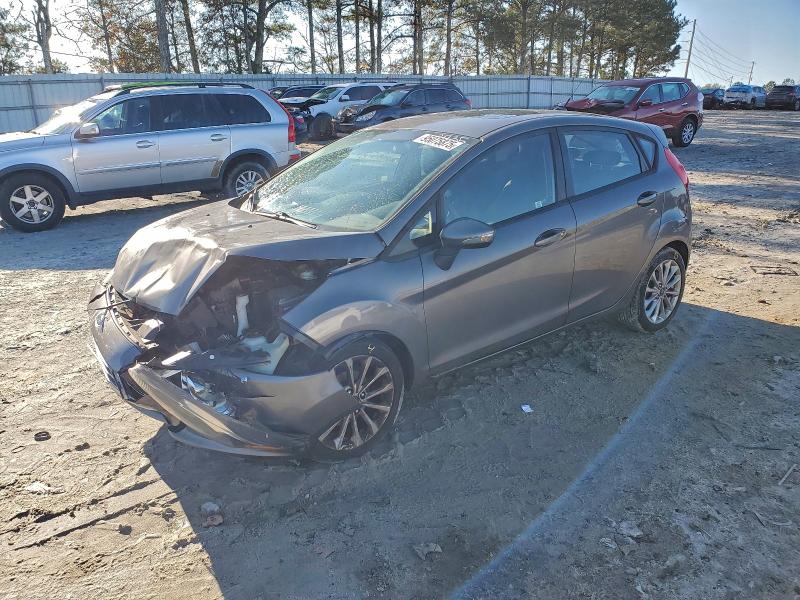 FORD FIESTA SE 2014 with VIN 3FADP4EJ7EM113735 - Photo from auction