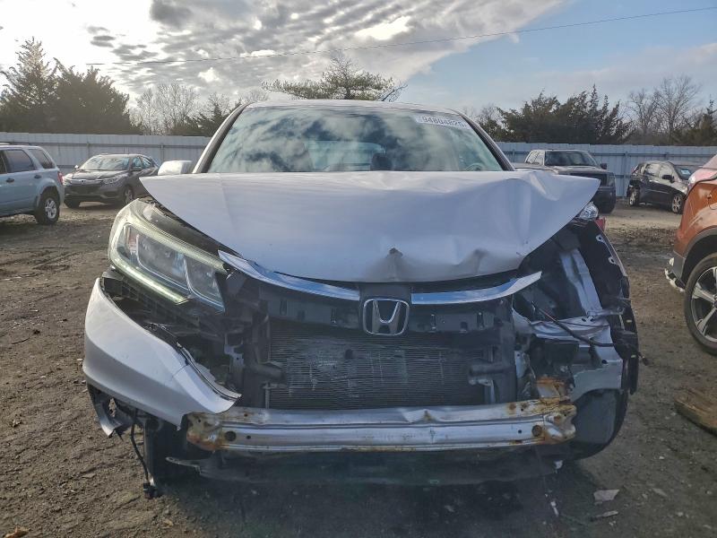 Photo 5 from auction – 2016 HONDA CR-V EX with VIN 2HKRM4H53GH681951