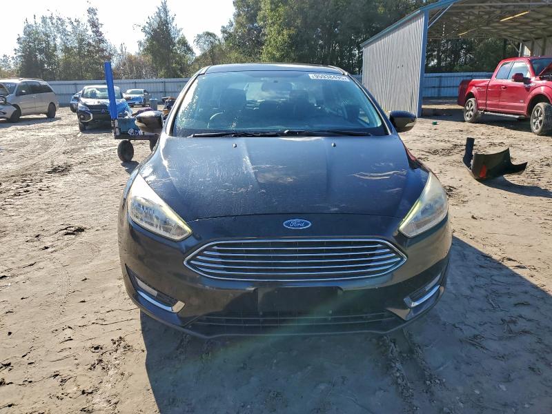 Photo 5 from auction – 2016 FORD FOCUS TITA with VIN 1FADP3N20GL371330