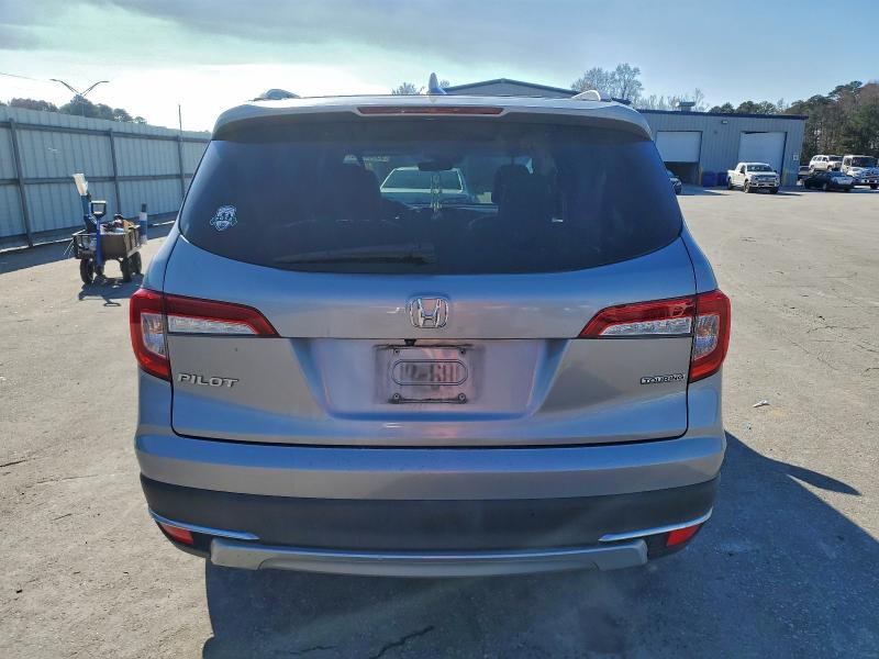 Photo 6 from auction – 2021 HONDA PILOT TOUR with VIN 5FNYF5H95MB009513