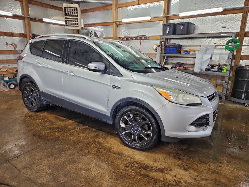 Photo 4 from auction – 2015 FORD ESCAPE TIT with VIN 1FMCU0JX7FUA89849