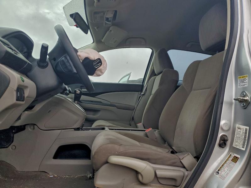 Photo 7 from auction – 2014 HONDA CR-V LX with VIN 2HKRM3H36EH509595