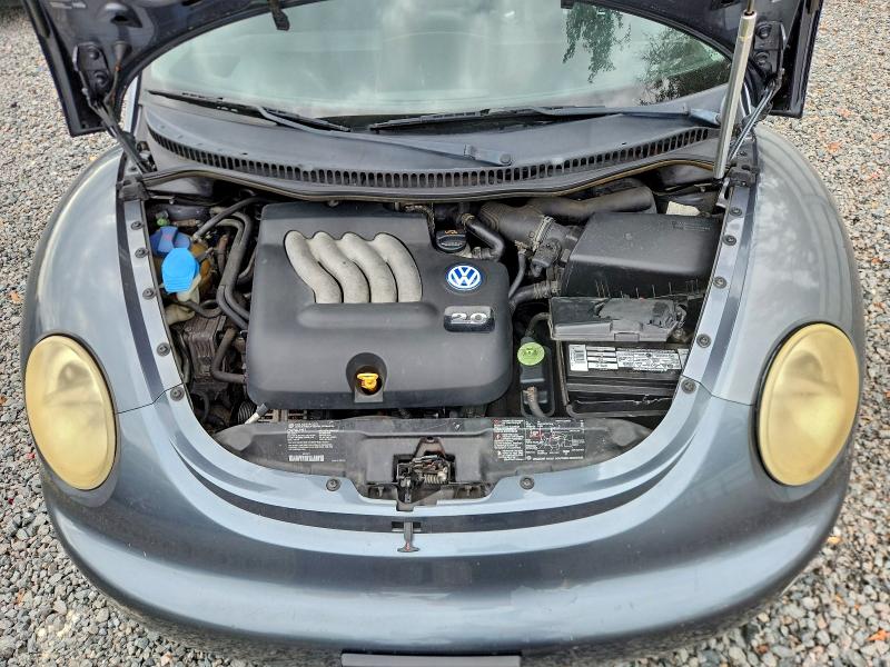 Photo 11 from auction – 2004 VOLKSWAGEN NEW BEETLE with VIN 3VWCB21C62M461129